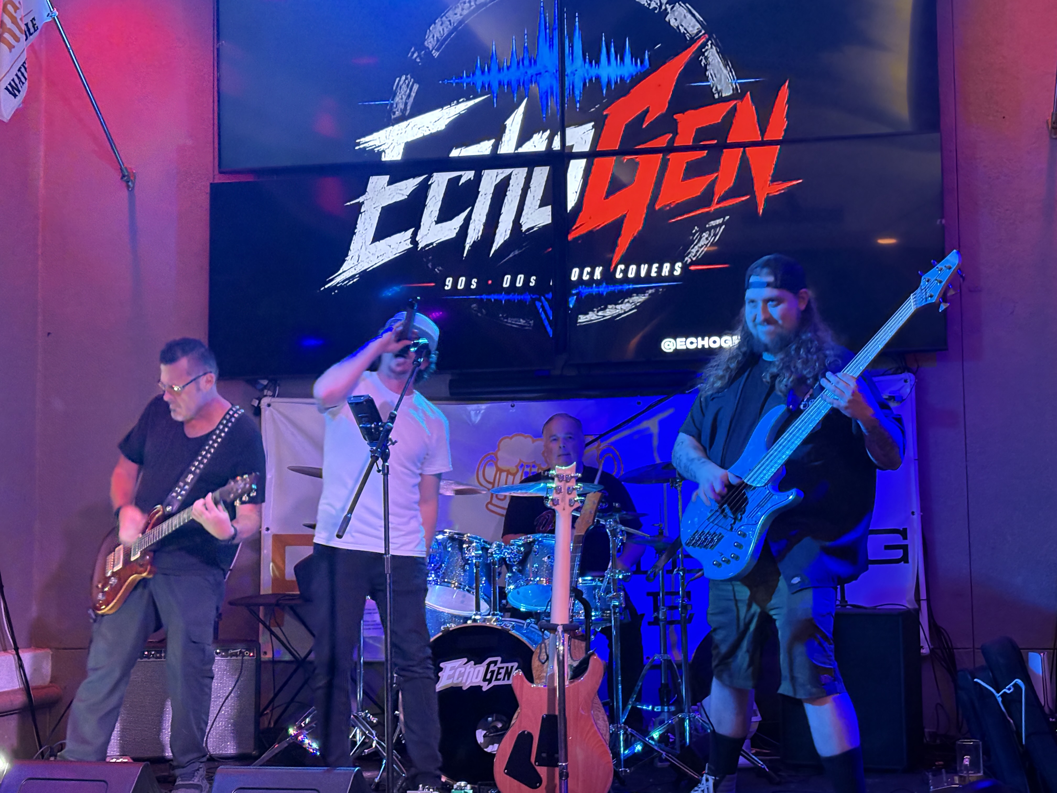 EchoGen performing live on stage
