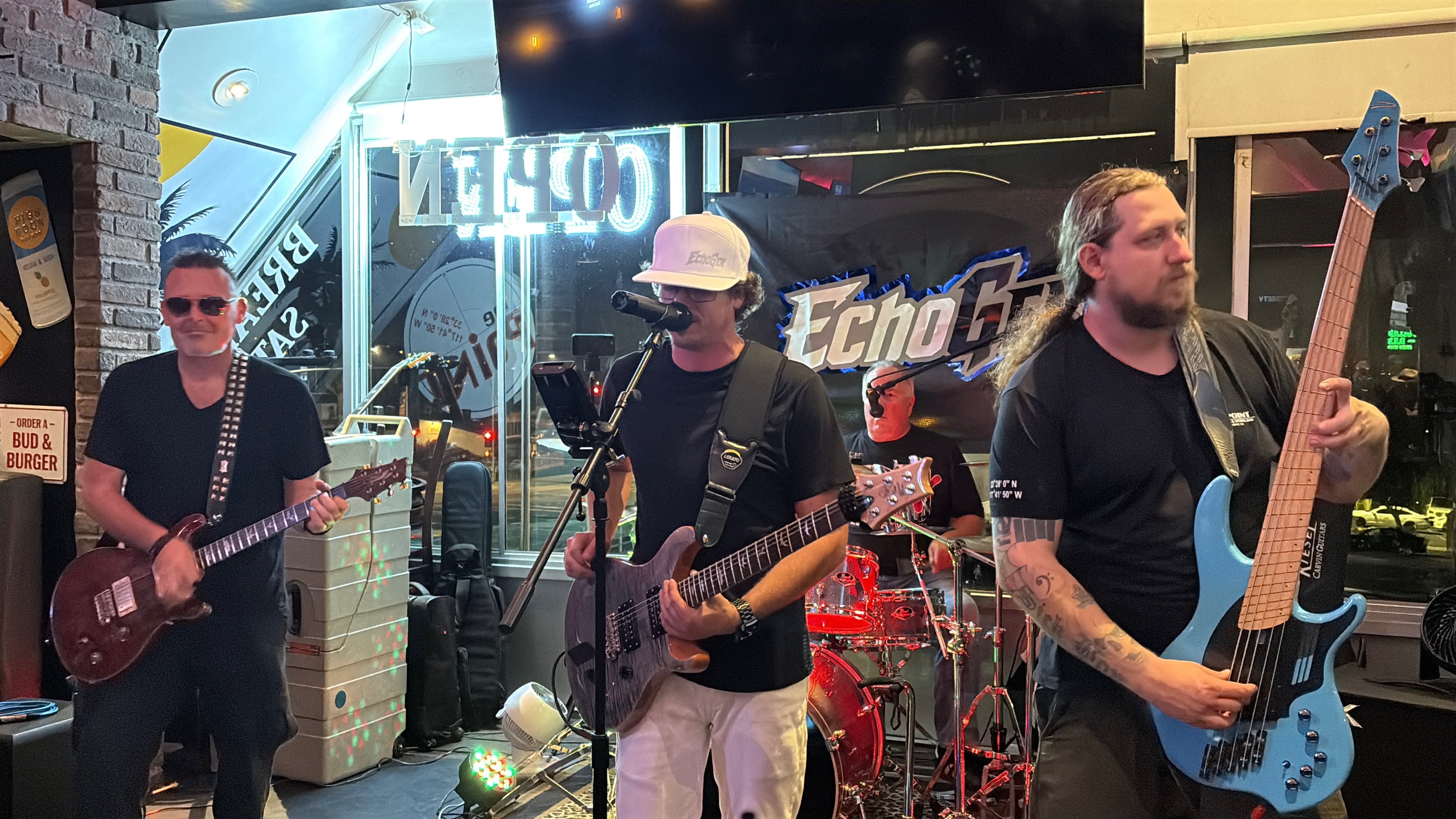 EchoGen band members performing together on stage